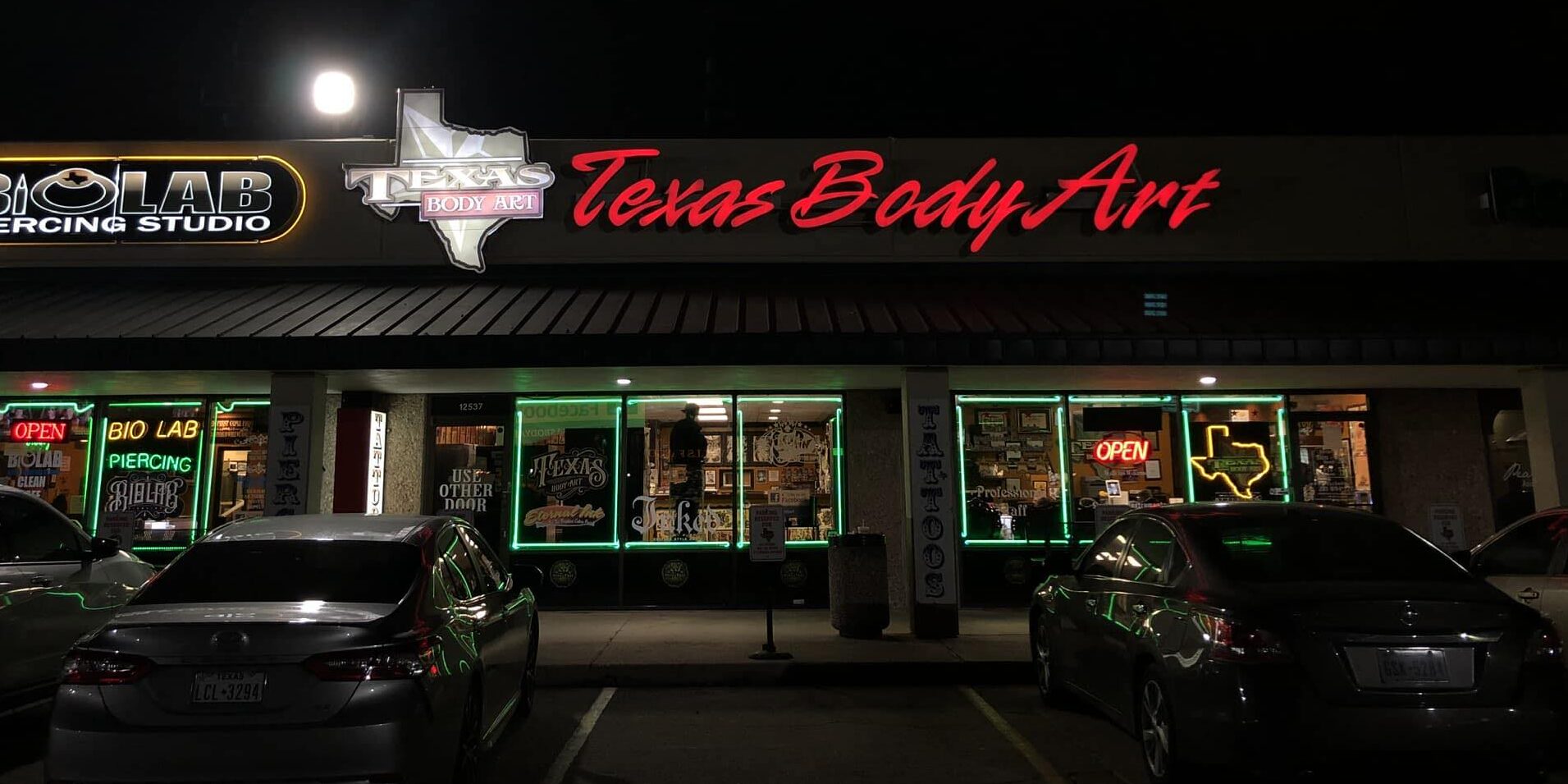 Texas Body Art & Bio Lab Piercing storefront at night, Houston Texas