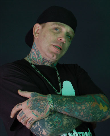 Johnny Jackson — Houston tattoo artist, arms crossed